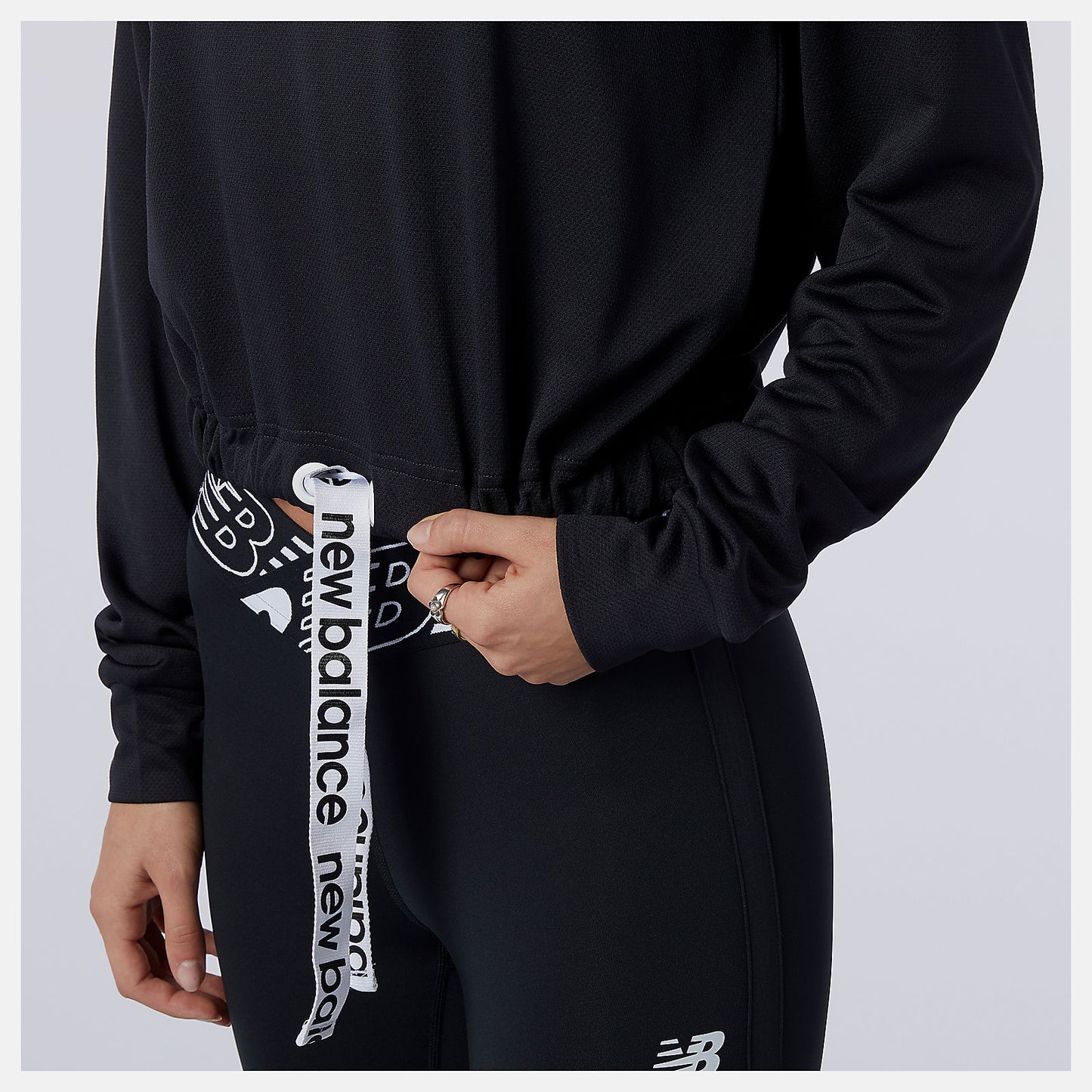 New Balance Discount - Relentless Cinched Hem Hoodie