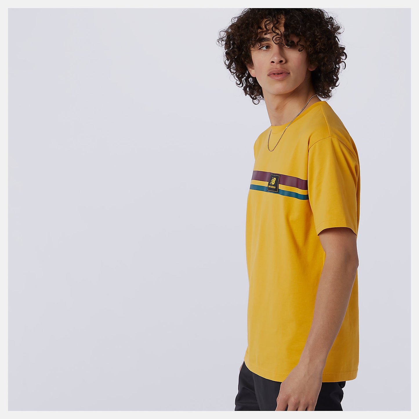 New Balance Outlet - NB Athletics Higher Learning Badge Tee